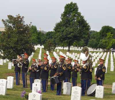 Burial at Arlington Cemetery with band and full honors.