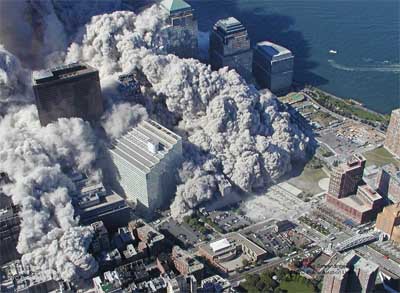 911 WTC Collapse of North Tower throws silicate ash over entire lower Manhattan area - aerial view