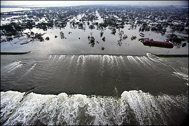 Inner Harbor Navigation Canal levee is topped and breeched.