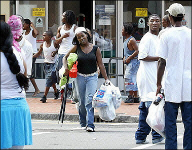 Looters outside store.