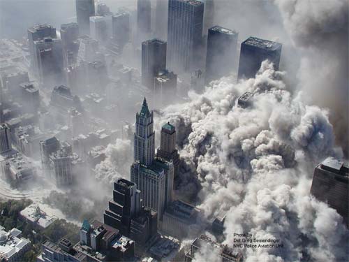 911 WTC Collapse of North Tower in full probressive collapse - aerial view