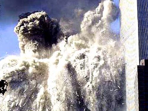 911 WTC North Tower collapses in place, beginning at 10:28 AM.