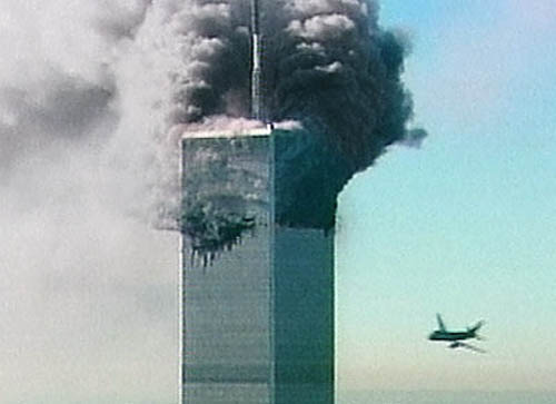 911 Flight UA175 against blue sky heads for WTC2 South Tower
