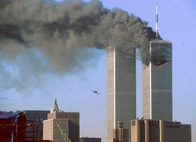 911 - South Tower - UA 175 plane Against Sky - Both Towers standing