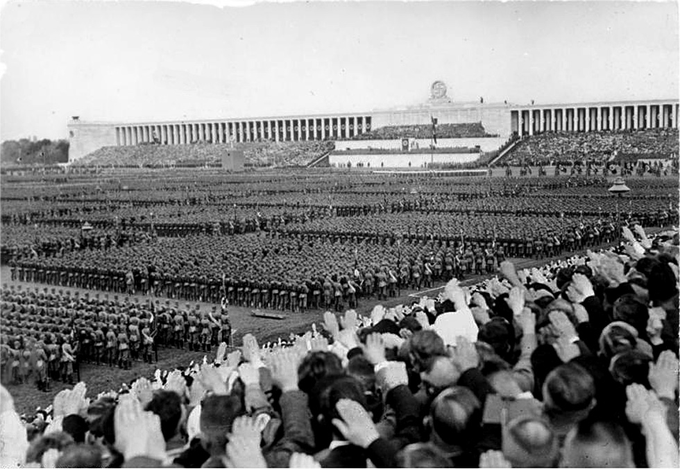 Hitler rallies his base in 1938. 1.3M people took trains to Nuremberg. WWII Hitler Nuremberg Rally